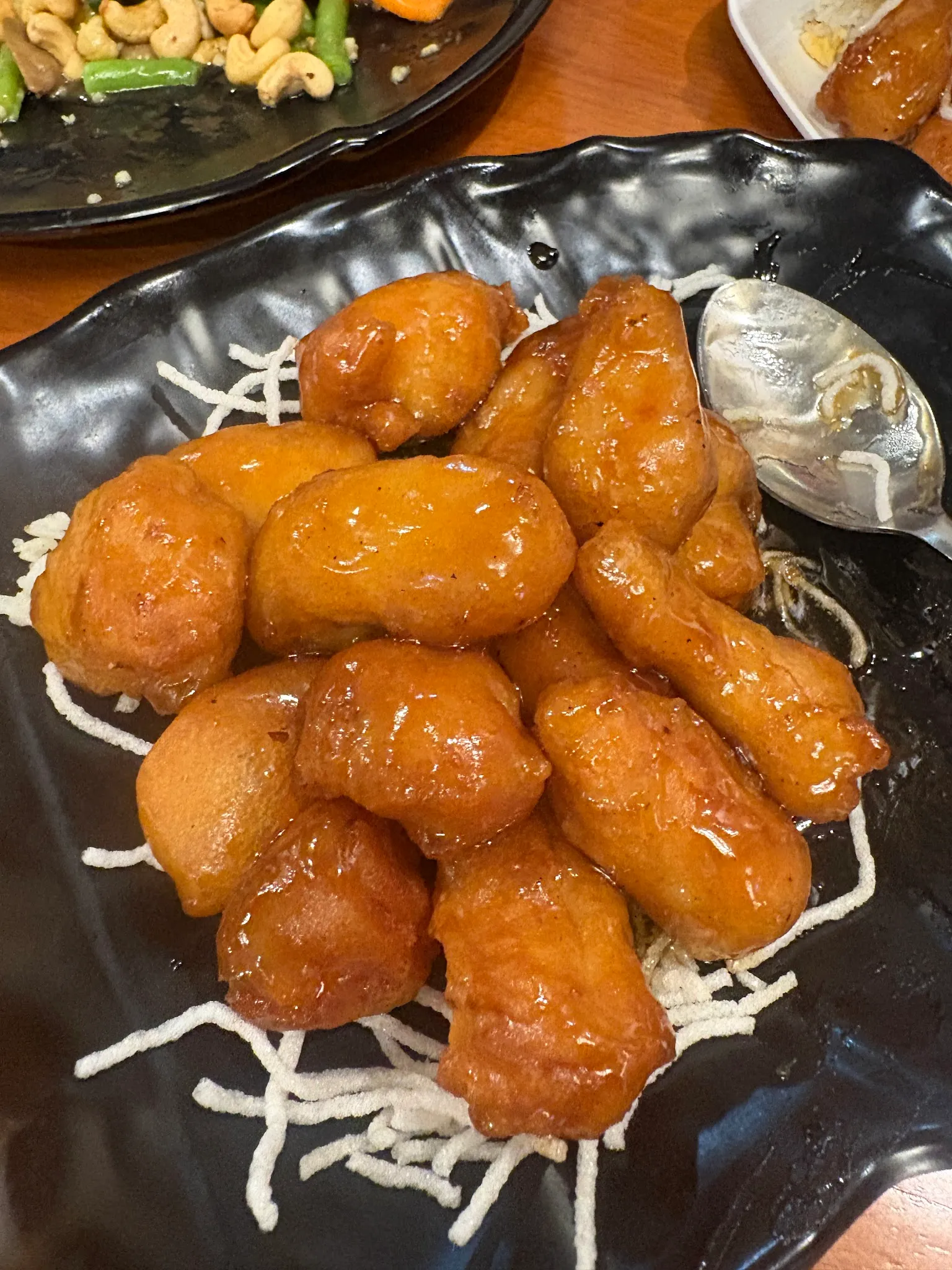 Honey glazed chicken on crispy noodles